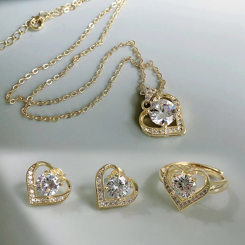 "BIJOUX" Ensemble de bijoux, comprenant une bague de promesse, des boucles d'oreilles et un collier en argent sterling