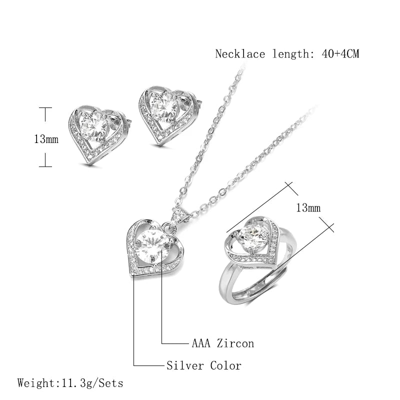 "BIJOUX" Ensemble de bijoux, comprenant une bague de promesse, des boucles d'oreilles et un collier en argent sterling